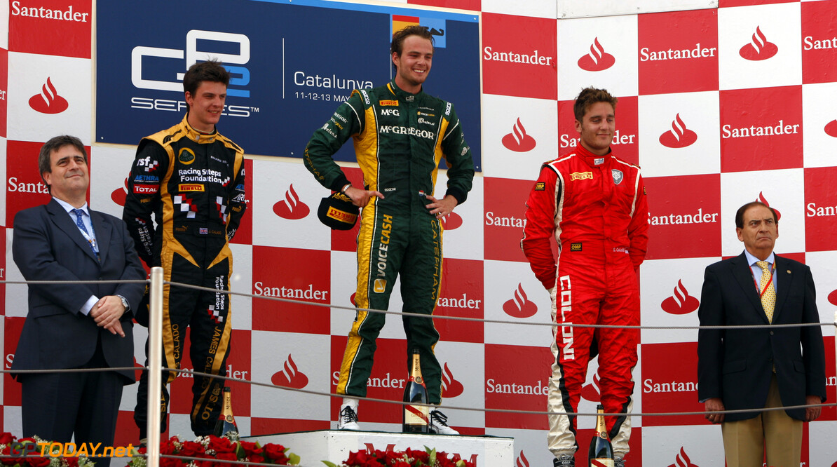 2012 GP2 Series.  Round 4.
Circuit de Catalunya, Barcelona, Spain. 12th May. 
Saturday Race.
Giedo Van der Garde (NED, Caterham Racing) celebrates his victory on the podium with James Calado (GBR, Lotus GP) and Stefano Coletti (ITA, Scuderia Coloni).
World Copyright: Alastair Staley/GP2 Media Service. 
Ref: Digital Image _O9T4633.jpg










RoundFour
