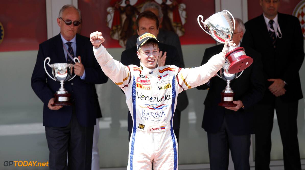 2012 GP2 Series. Round 5. 
Monte Carlo, Monaco. 25th May 2012. 
Friday Race.
Johnny Cecotto (VEN, Barwa Addax Team) celebrates his victory on the podium.
Photo: Alastair Staley/GP2 Media Service. 
Ref: Digital Image AS5D2884.jpg





