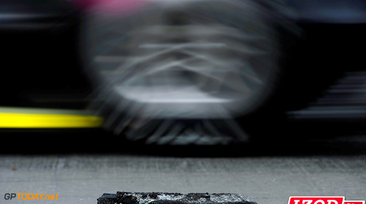 2012 Indy Lights Detroit Belle Isle Priority
1-2 June, 2012, Detroit, Michigan, USA.A chunk of the track surface lies outside of the racing groove at turn 13 as a IndyCar races by..(c)2012, F. Peirce Williams.LAT Photo USA