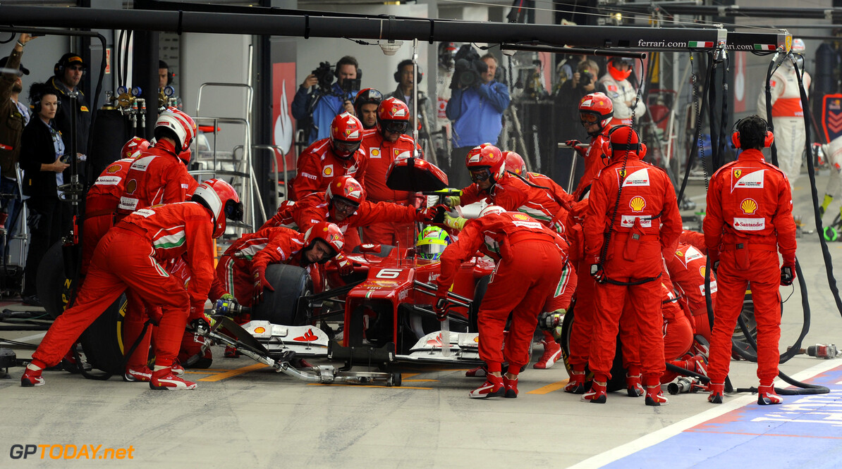 Massa succumbs to team orders, Button still fighting