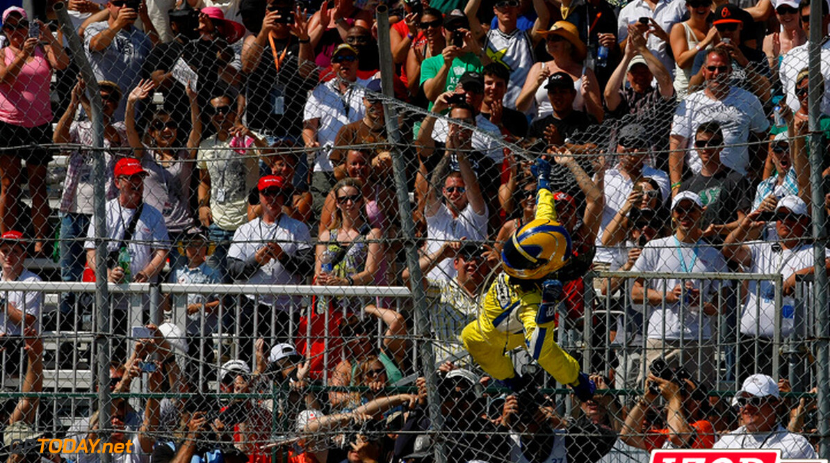 2012 IndyCar Edmonton priority
20-22 July, 2012, Edmonton, Alberta, Canada.Winner Helio Castroneves celebrates by climbing the fence.(c)2012, Phil Abbott.LAT Photo USA.IMAGE COURTESY OF INDYCAR FOR EDITORIAL USAGE ONLY.  MANDATORY CREDIT: "INDYCAR/LAT USA"

(c)2012, Michael L. Levitt
Edmonton
Canada

Helio Castroneves victory celebration 2012 IndyCar Edmonton