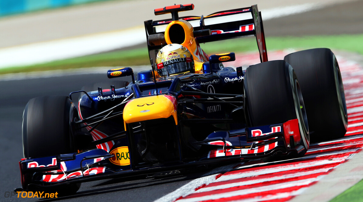 141017822KR00173_F1_Grand_P
BUDAPEST, HUNGARY - JULY 27:  Sebastian Vettel of Germany and Red Bull Racing drives during practice for the Hungarian Formula One Grand Prix at the Hungaroring on July 27, 2012 in Budapest, Hungary.  (Photo by Mark Thompson/Getty Images) *** Local Caption *** Sebastian Vettel
F1 Grand Prix of Hungary - Practice
Mark Thompson
Budapest
Hungary

Formula One Racing