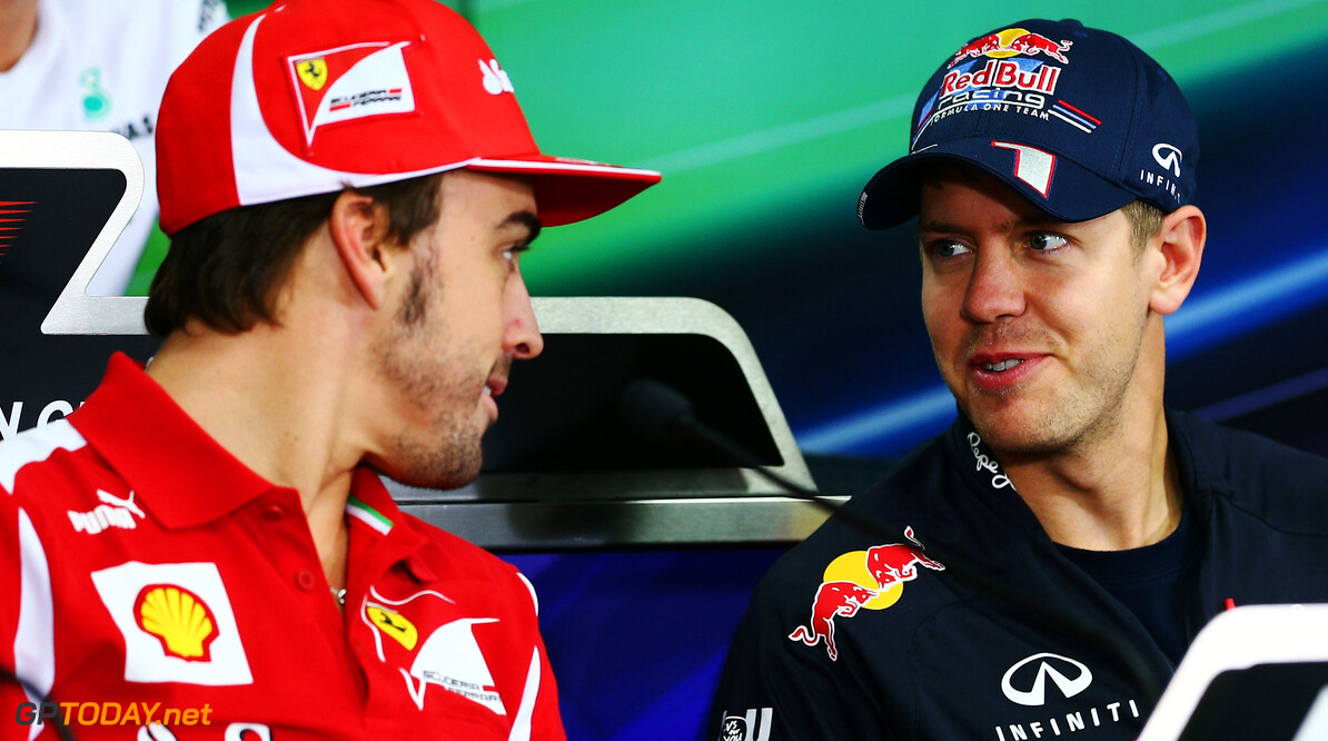 141020532KR00016_F1_Grand_P
YEONGAM-GUN, SOUTH KOREA - OCTOBER 11:  (L-R) Fernando Alonso of Spain and Ferrari talks with Sebastian Vettel of Germany and Red Bull Racing at the drivers press conference during previews for the Korean Formula One Grand Prix at the Korea International Circuit on October 11, 2012 in Yeongam-gun, South Korea.  (Photo by Clive Mason/Getty Images) *** Local Caption *** Fernando Alonso; Sebastian Vettel
F1 Grand Prix of Korea - Previews
Clive Mason
Yeongam-gun
South Korea

Formula One Racing SHELLGP