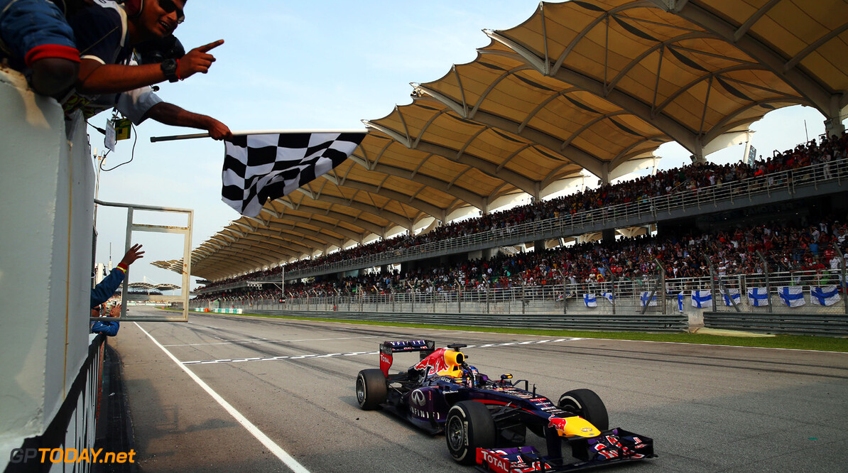 163375697KR00095_F1_Grand_P
KUALA LUMPUR, MALAYSIA - MARCH 24:  Sebastian Vettel of Germany and Infiniti Red Bull Racing crosses the finish line to win the Malaysian Formula One Grand Prix at the Sepang Circuit on March 24, 2013 in Kuala Lumpur, Malaysia.  (Photo by Mark Thompson/Getty Images) *** Local Caption *** Sebastian Vettel
F1 Grand Prix of Malaysia
Mark Thompson
Kuala Lumpur
Malaysia

Formula One Racing Malaysia F1 Grand Prix Malaysian Formula One Grand Pri Formula One Grand Prix formula 1 Auto Racing