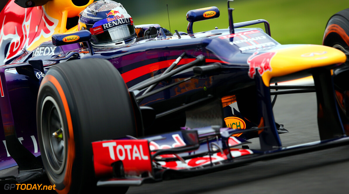 166987350KR00067_F1_Grand_P
SPA, BELGIUM - AUGUST 23:  Sebastian Vettel of Germany and Infiniti Red Bull Racing drives during practice for the Belgian Grand Prix at Circuit de Spa-Francorchamps on August 23, 2013 in Spa, Belgium.  (Photo by Clive Mason/Getty Images) *** Local Caption *** Sebastian Vettel
F1 Grand Prix of Belgium - Practice
Clive Mason
Spa
Belgium