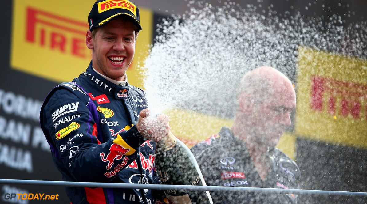 166987878GI00161_F1_Grand_P
MONZA, ITALY - SEPTEMBER 08:  Sebastian Vettel of Germany and Infiniti Red Bull Racing celebrates on the podium after winning the Italian Formula One Grand Prix at Autodromo di Monza on September 8, 2013 in Monza, Italy.  (Photo by Clive Mason/Getty Images) *** Local Caption *** Sebastian Vettel
F1 Grand Prix of Italy - Race
Clive Mason
Monza
Italy