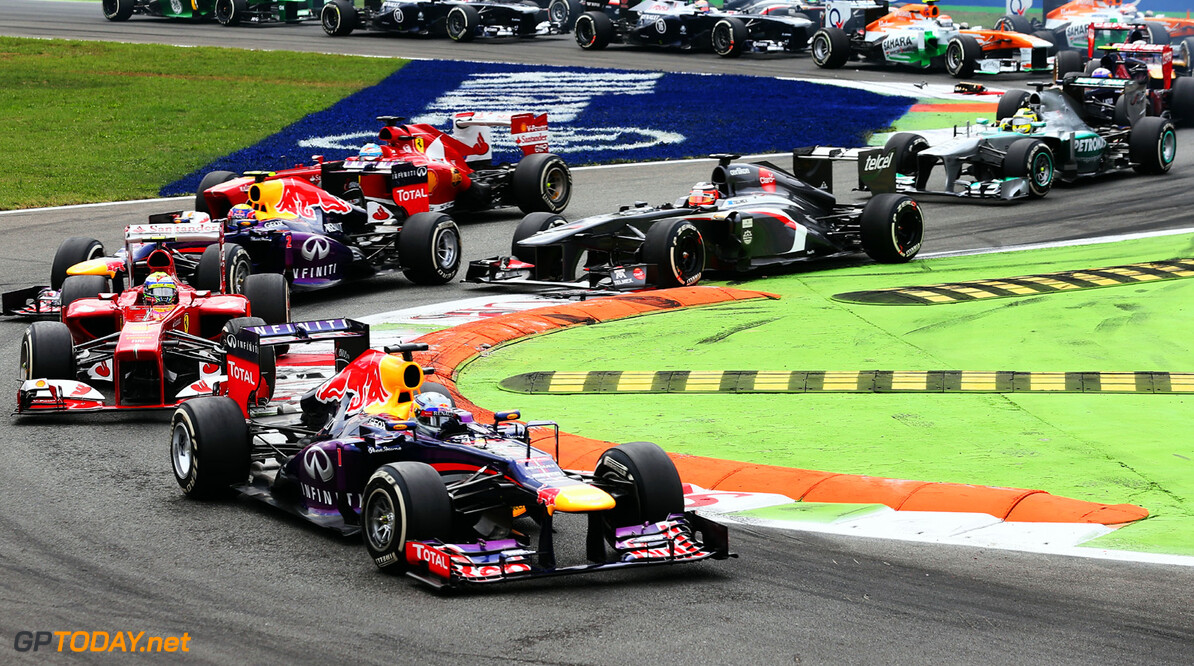 166987878GI00099_F1_Grand_P
MONZA, ITALY - SEPTEMBER 08:  Sebastian Vettel of Germany and Infiniti Red Bull Racing leads through the first corner at the start of the the Italian Formula One Grand Prix at Autodromo di Monza on September 8, 2013 in Monza, Italy.  (Photo by Mark Thompson/Getty Images) *** Local Caption *** Sebastian Vettel
F1 Grand Prix of Italy - Race
Mark Thompson
Monza
Italy