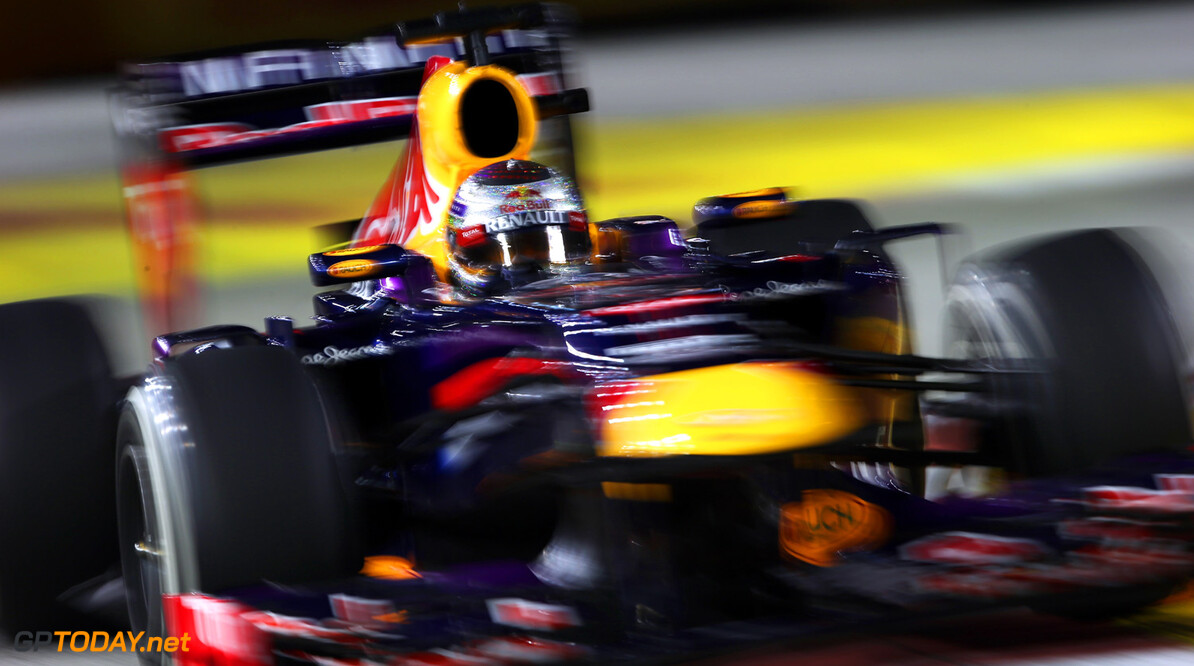 SINGAPORE - SEPTEMBER 22:  Sebastian Vettel of Germany and Infiniti Red Bull racing leads during the Singapore Formula One Grand Prix at Marina Bay Street Circuit on September 22, 2013 in Singapore, Singapore.  (Photo by Mark Thompson/Getty Images) *** Local Caption *** Sebastian Vettel
F1 Grand Prix of Singapore
Mark Thompson
Singapore
Singapore