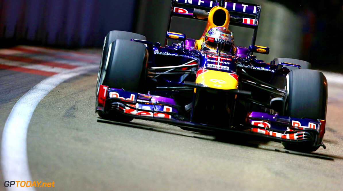 SINGAPORE - SEPTEMBER 20:  Sebastian Vettel of Germany and Infiniti Red Bull racing drives during practice for the Singapore Formula One Grand Prix at Marina Bay Street Circuit on September 20, 2013 in Singapore, Singapore.  (Photo by Mark Thompson/Getty Images) *** Local Caption *** Sebastian Vettel
F1 Grand Prix of Singapore - Practice
Mark Thompson
Singapore
Singapore

SHELL GP SHELLF1GP