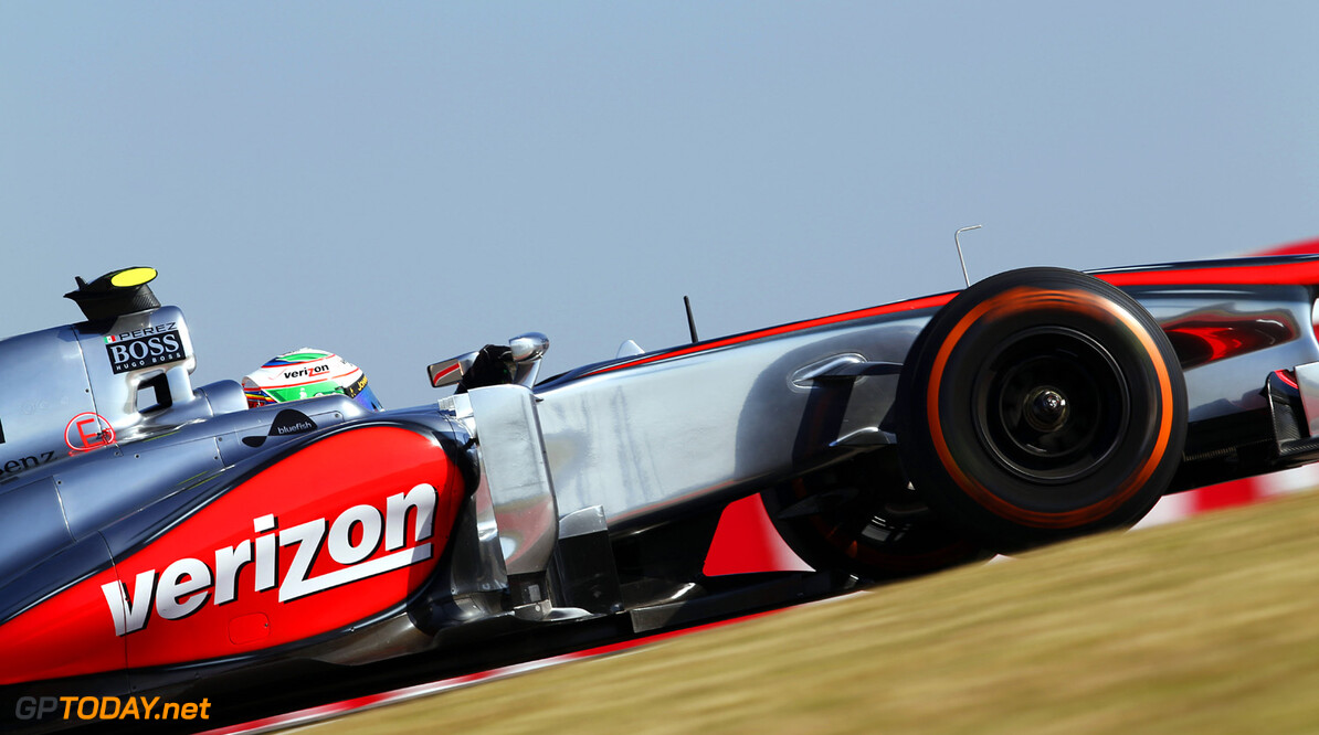 Sergio Perez on track.