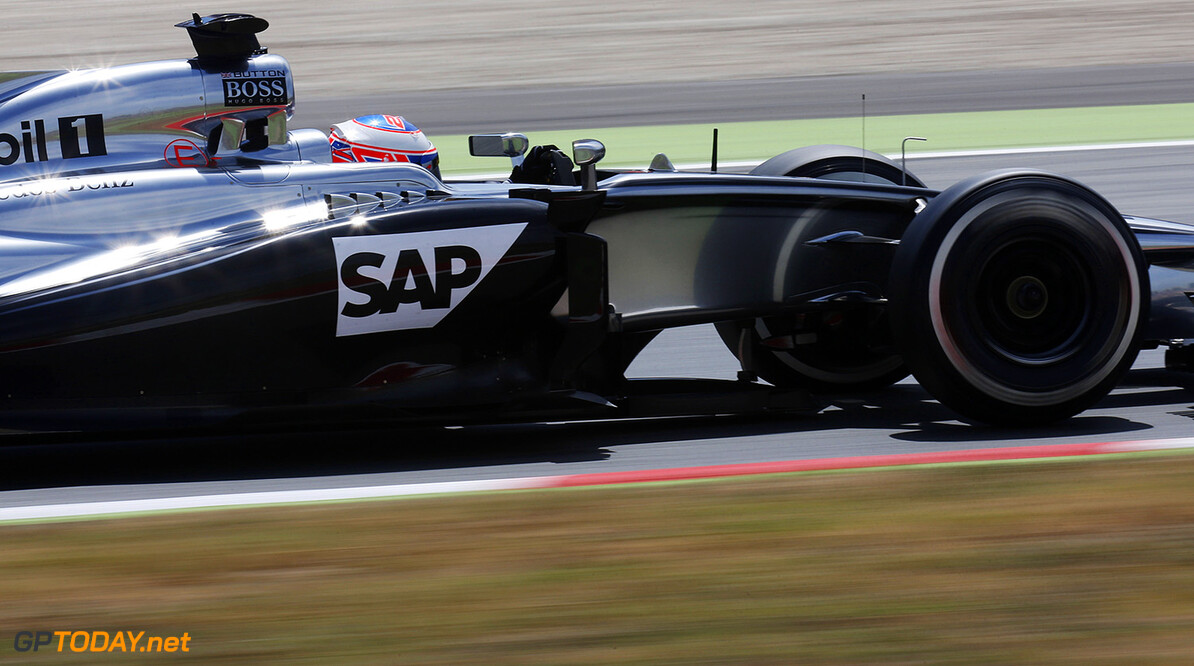 Jenson Button on track.