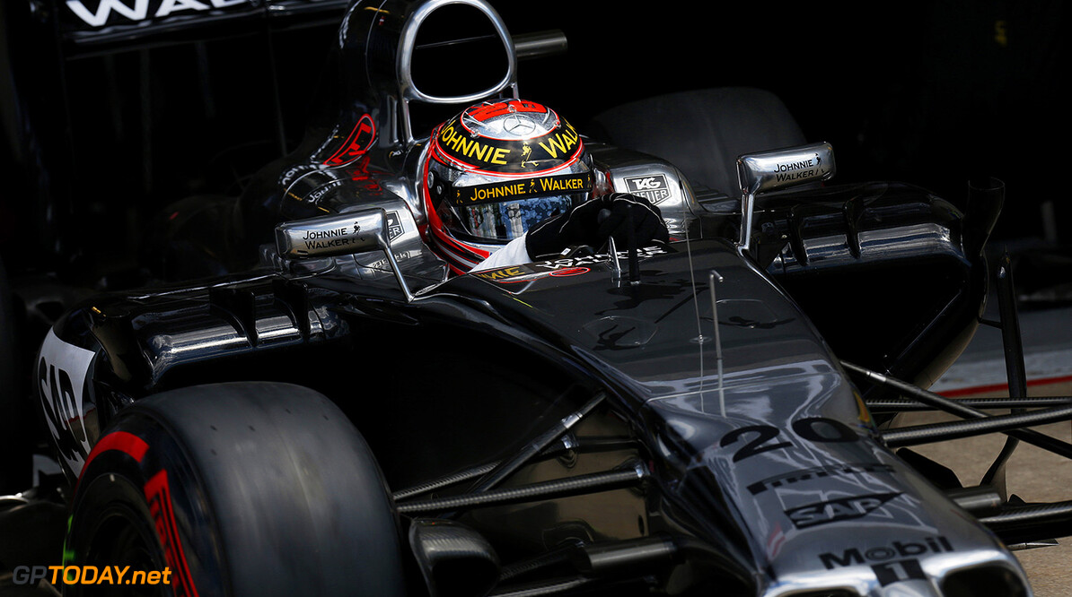 Kevin Magnussen drives out of the garage.
