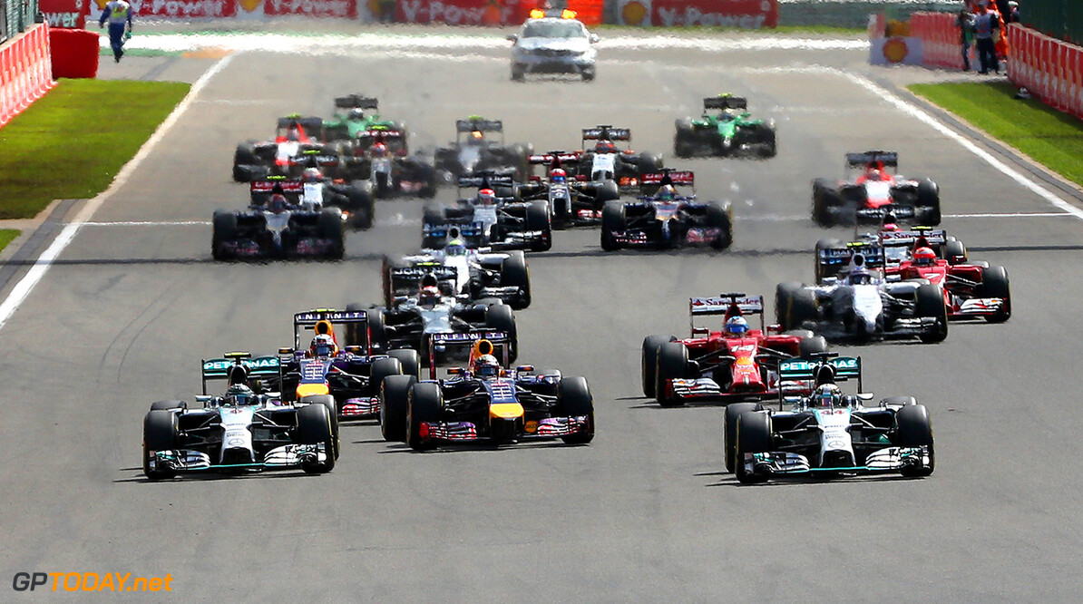 SPA, BELGIUM - AUGUST 24:  Lewis Hamilton of Great Britain and Mercedes GP leads Nico Rosberg of Germany and Mercedes GP and Sebastian Vettel of Germany and Infiniti Red Bull Racing into the first corner during the Belgian Grand Prix at Circuit de Spa-Francorchamps on August 24, 2014 in Spa, Belgium.  (Photo by Mark Thompson/Getty Images) *** Local Caption *** Lewis Hamilton;Nico Rosberg;Sebastian Vettel
F1 Grand Prix of Belgium
Mark Thompson
Spa
Belgium

Formula One Racing formula 1 Auto Racing Formula One Grand Prix Belgium Grand Prix Belgian Formula One Grand Prix