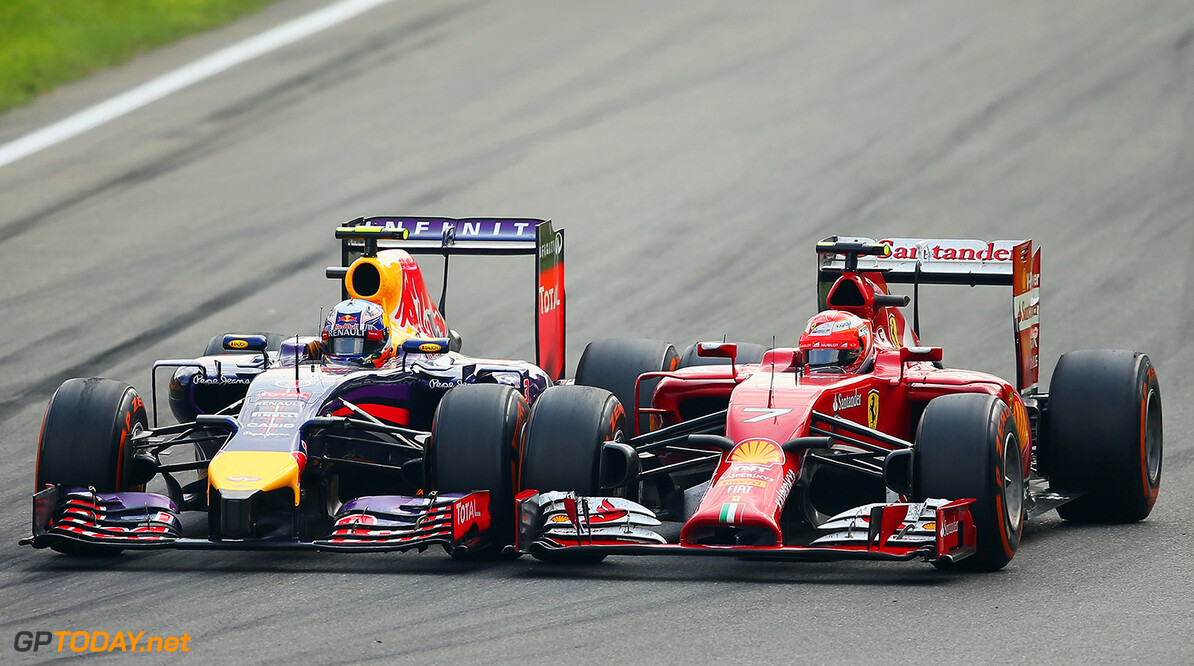 MONZA, ITALY - SEPTEMBER 07:  (L-R) Daniel Ricciardo of Australia and Infiniti Red Bull Racing and Kimi Raikkonen of Finland and Ferrari come together prior to turn one during the F1 Grand Prix of Italy at Autodromo di Monza on September 7, 2014 in Monza, Italy.  (Photo by Bryn Lennon/Getty Images) *** Local Caption *** Daniel Ricciardo;Kimi Raikkonen
F1 Grand Prix of Italy
Bryn Lennon
Monza
Italy

shellf1gp