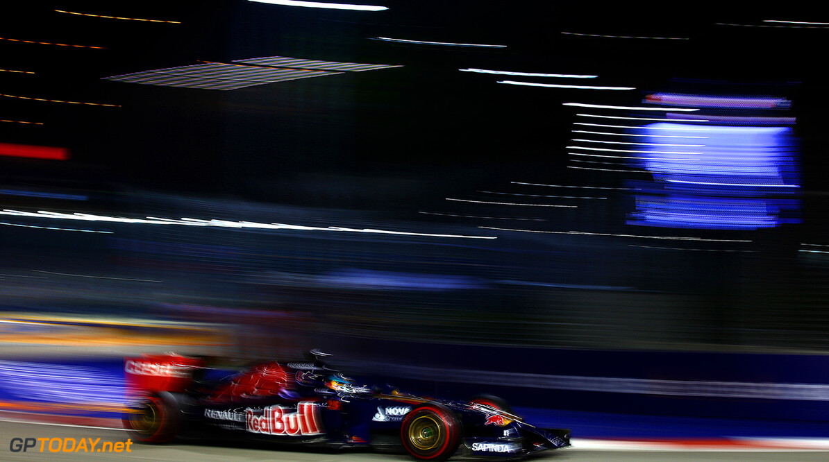 SINGAPORE - SEPTEMBER 21:  Jean-Eric Vergne of France and Scuderia Toro Rosso drives during the Singapore Formula One Grand Prix at Marina Bay Street Circuit on September 21, 2014 in Singapore, Singapore.  (Photo by Mark Thompson/Getty Images) *** Local Caption *** Jean-Eric Vergne
F1 Grand Prix of Singapore
Mark Thompson
Singapore
Singapore

Formula One Racing formula 1 Auto Racing Formula One Grand Prix Marina Bay Street Circuit Singapore Grand Prix