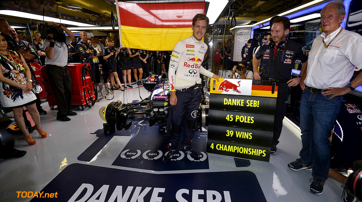 ABU DHABI, UNITED ARAB EMIRATES - NOVEMBER 23:  Sebastian Vettel of Germany and Infiniti Red Bull Racing poses with Infiniti Red Bull Racing Team Principal Christian Horner and team consultant Dr Helmut Marko next to a pit board displaying his achievements with the team in the garage before the Abu Dhabi Formula One Grand Prix at Yas Marina Circuit on November 23, 2014 in Abu Dhabi, United Arab Emirates.  (Photo by Getty Images/Getty Images) *** Local Caption *** Sebastian Vettel;Christian Horner;Helmut Marko
F1 Grand Prix of Abu Dhabi
Getty Images
Abu Dhabi
United Arab Emirates

formula one racing