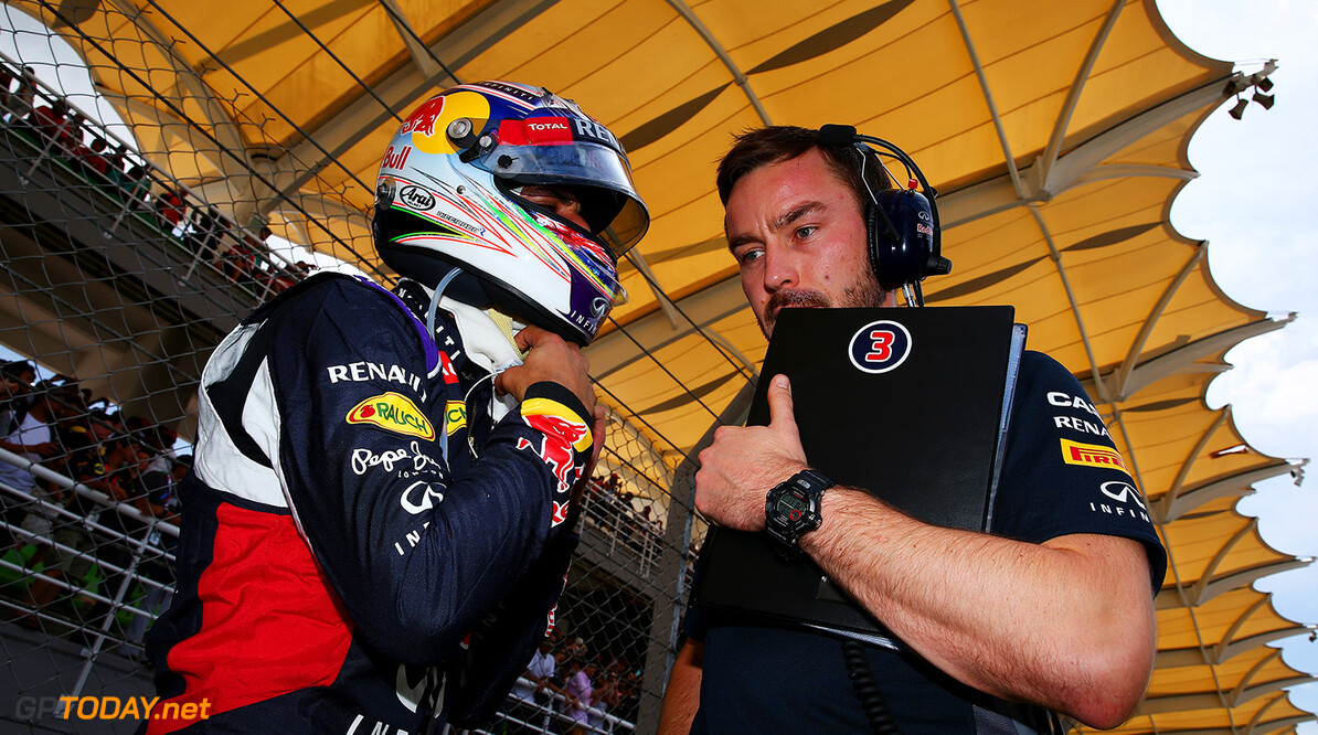 KUALA LUMPUR, MALAYSIA - MARCH 29:  Daniel Ricciardo of Australia and Infiniti Red Bull Racing speaks with his race engineer Simon Rennie on the grid before the Malaysia Formula One Grand Prix at Sepang Circuit on March 29, 2015 in Kuala Lumpur, Malaysia.  (Photo by Mark Thompson/Getty Images) // Getty Images/Red Bull Content Pool // P-20150329-00284 // Usage for editorial use only // Please go to www.redbullcontentpool.com for further information. // 
F1 Grand Prix of Malaysia
Mark Thompson
Sepang
Malaysia

P-20150329-00284