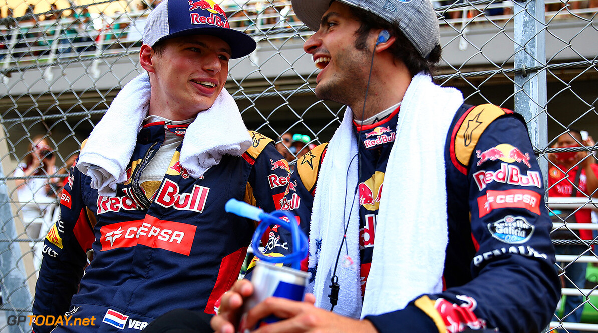 KUALA LUMPUR, MALAYSIA - MARCH 29:  Max Verstappen of Netherlands and Scuderia Toro Rosso and Carlos Sainz of Spain and Scuderia Toro Rosso speak on the grid before the Malaysia Formula One Grand Prix at Sepang Circuit on March 29, 2015 in Kuala Lumpur, Malaysia.  (Photo by Mark Thompson/Getty Images) *** Local Caption *** Max Verstappen;Carlos Sainz
F1 Grand Prix of Malaysia
Mark Thompson
Kuala Lumpur
Malaysia

Formula One Racing formula 1 Auto Racing Malaysia F1 Grand Prix Malaysian Formula One Grand Prix Formula One Grand Prix