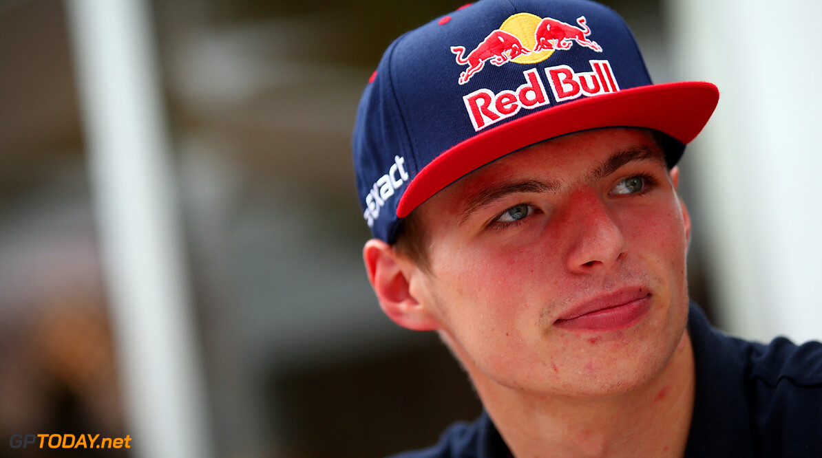 SINGAPORE - SEPTEMBER 17:  Max Verstappen of Netherlands and Scuderia Toro Rosso speaks with members of the press in the paddock during previews to the Formula One Grand Prix of Singapore at Marina Bay Street Circuit on September 17, 2015 in Singapore.  (Photo by Mark Thompson/Getty Images) // Getty Images/Red Bull Content Pool // P-20150917-00087 // Usage for editorial use only // Please go to www.redbullcontentpool.com for further information. // 
F1 Grand Prix of Singapore - Previews
Mark Thompson
Singapore
Singapore

P-20150917-00087