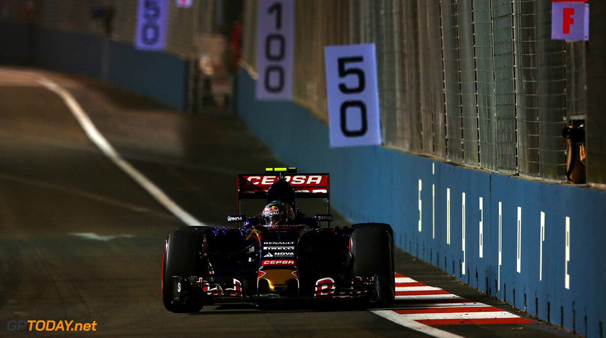 SINGAPORE - SEPTEMBER 18:  Carlos Sainz of Spain and Scuderia Toro Rosso drives during practice for the Formula One Grand Prix of Singapore at Marina Bay Street Circuit on September 18, 2015 in Singapore.  (Photo by Mark Thompson/Getty Images) // Getty Images/Red Bull Content Pool // P-20150918-00573 // Usage for editorial use only // Please go to www.redbullcontentpool.com for further information. // 
F1 Grand Prix of Singapore - Practice
Mark Thompson
Singapore
Singapore

P-20150918-00573