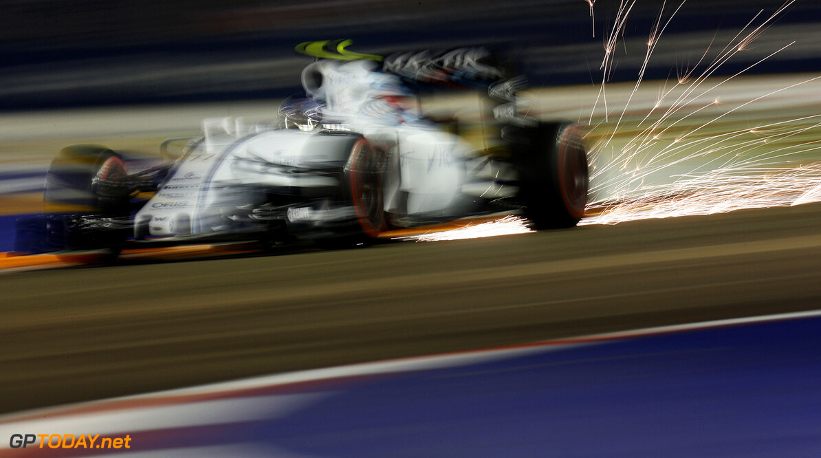 Marina Bay Circuit, Singapore.
Saturday 19 September 2015.
Sparks fly from the car of Valtteri Bottas, Williams FW37 Mercedes.
Photo: Alastair Staley/Williams
ref: Digital Image W79P2206





Action