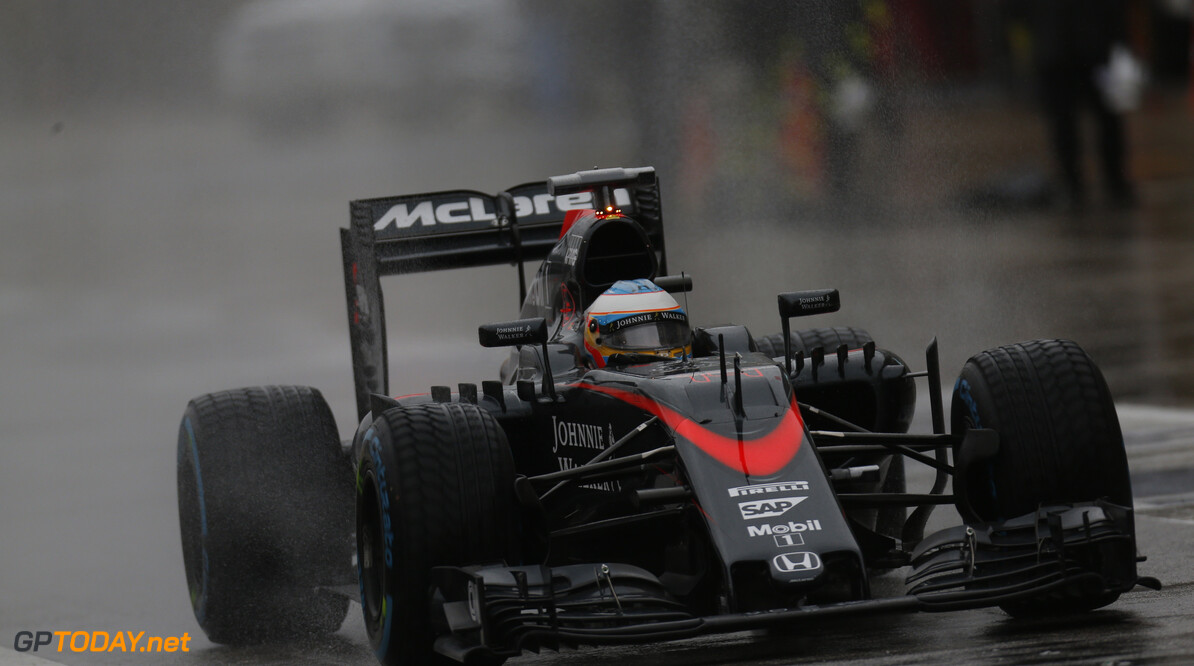 Fernando Alonso in the pit lane.