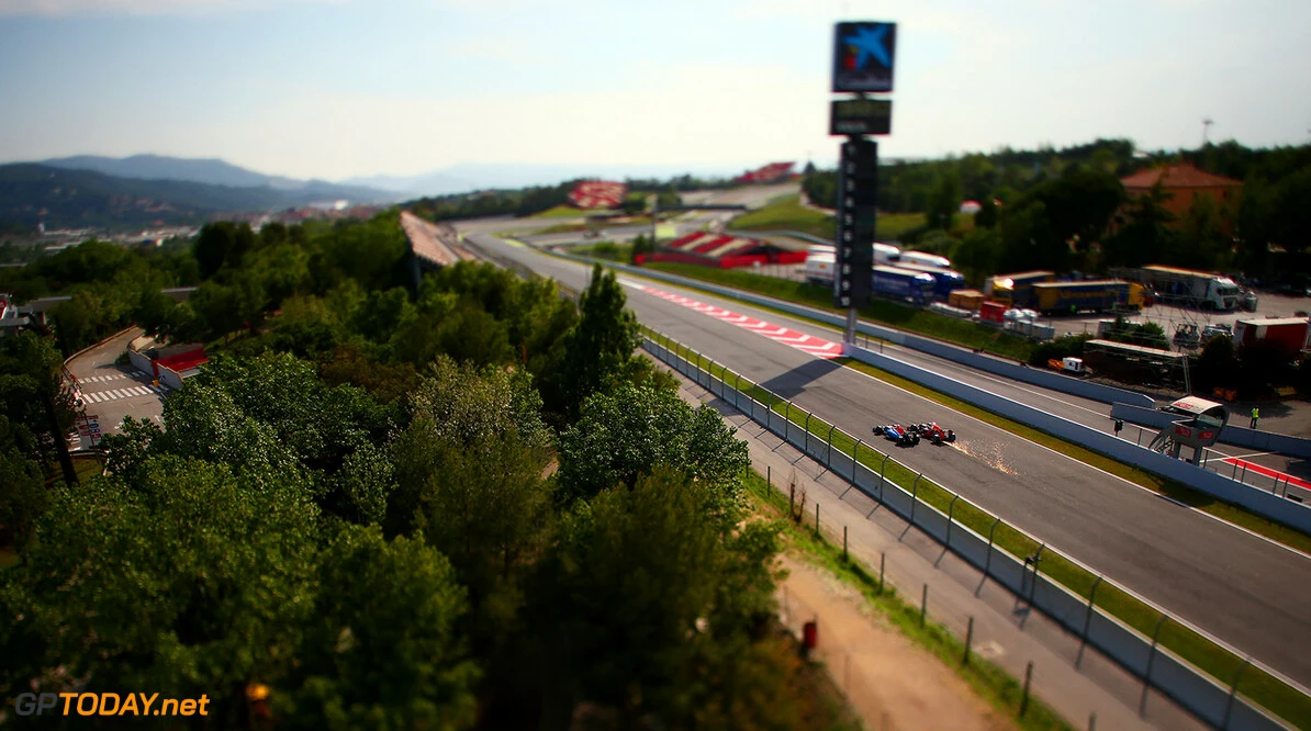 MONTMELO, SPAIN - MAY 18:  (EDITORS NOTE: Image was created using a variable planed lens) Sparks fly as Max Verstappen of Netherlands and Red Bull Racing overtakes Jordan King of Great Britain and Manor Racing during day two of formula one testing at Circuit de Catalunya on May 18, 2016 in Montmelo, Spain.  (Photo by Dan Istitene/Getty Images) // Getty Images / Red Bull Content Pool  // P-20160518-00696 // Usage for editorial use only // Please go to www.redbullcontentpool.com for further information. // 
F1 Testing In Barcelona
Dan Istitene

Spain

P-20160518-00696