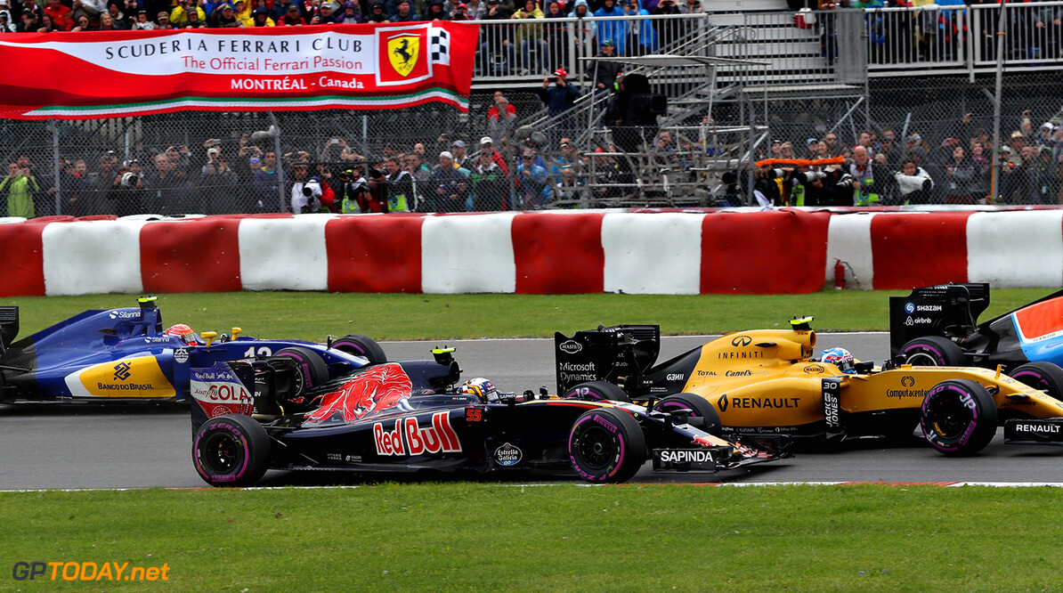 MONTREAL, QC - JUNE 12: Daniil Kvyat of Russia driving the (26) Scuderia Toro Rosso STR11 Ferrari 060/5 turbo battles for position with Jolyon Palmer of Great Britain driving the (30) Renault Sport Formula One Team Renault RS16 Renault RE16 turbo and Felipe Nasr of Brazil driving the (12) Sauber F1 Team Sauber C35 Ferrari 059/5 turbo on track during the Canadian Formula One Grand Prix at Circuit Gilles Villeneuve on June 12, 2016 in Montreal, Canada.  (Photo by Mark Thompson/Getty Images) // Getty Images / Red Bull Content Pool  // P-20160612-01437 // Usage for editorial use only // Please go to www.redbullcontentpool.com for further information. // 
Canadian F1 Grand Prix
Mark Thompson
Montreal (City)
Canada

P-20160612-01437
