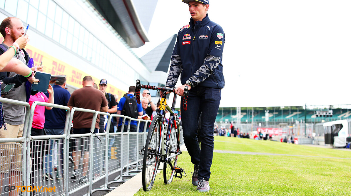 NORTHAMPTON, ENGLAND - JULY 07:  Max Verstappen of Netherlands and Red Bull Racing walks with his bike during previews ahead of the Formula One Grand Prix of Great Britain at Silverstone on July 7, 2016 in Northampton, England.  (Photo by Charles Coates/Getty Images) // Getty Images / Red Bull Content Pool  // P-20160707-01123 // Usage for editorial use only // Please go to www.redbullcontentpool.com for further information. // 
F1 Grand Prix of Great Britain - Previews
Charles Coates
Silverstone
United Kingdom

P-20160707-01123