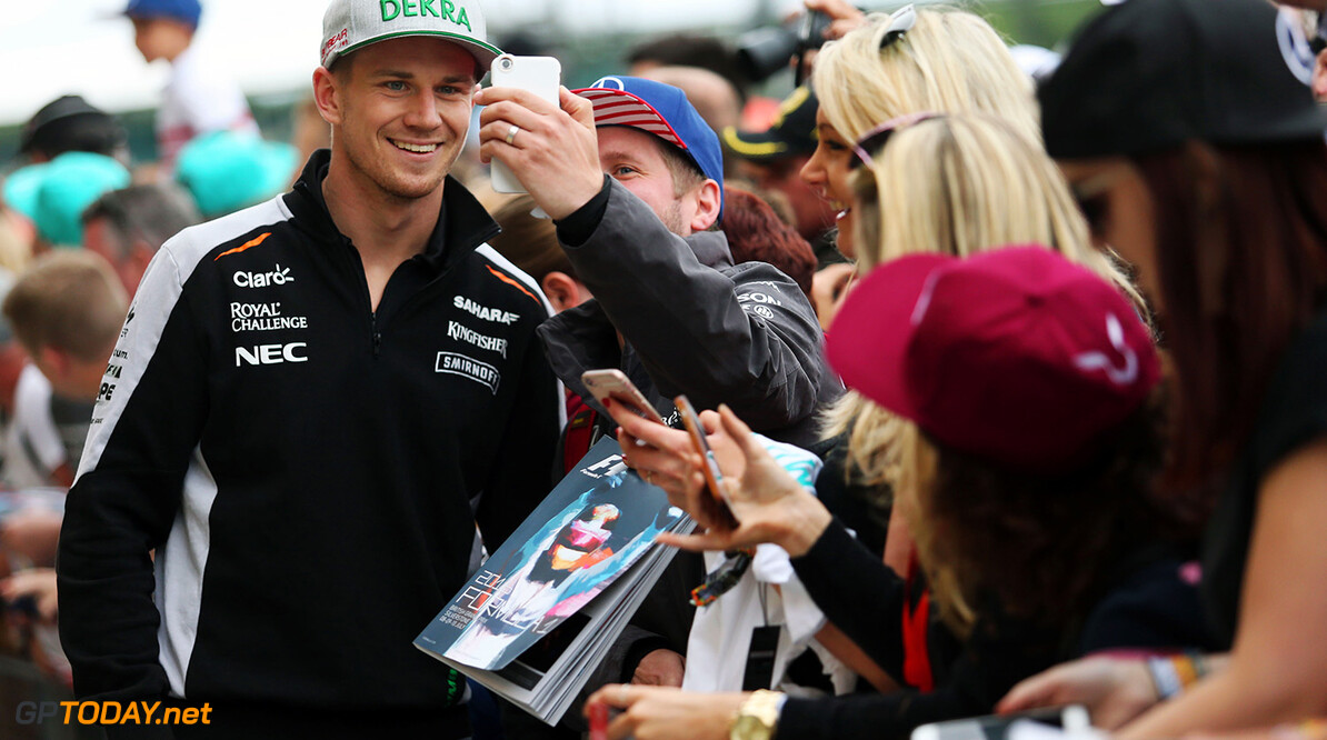 Formula One World Championship
Nico Hulkenberg (GER) Sahara Force India F1 with fans.
British Grand Prix, Thursday 7th July 2016. Silverstone, England.
Motor Racing - Formula One World Championship - British Grand Prix - Preparation Day - Silverstone, England
James Moy Photography
Silverstone
England

Formula One Formula 1 F1 GP Grand Prix Circuit Britain British England UK United Kingdom Silverstone JM594 Hulkenberg H?lkenberg Huelkenberg Crowd Fans Spectators Audience Portrait GP1610a