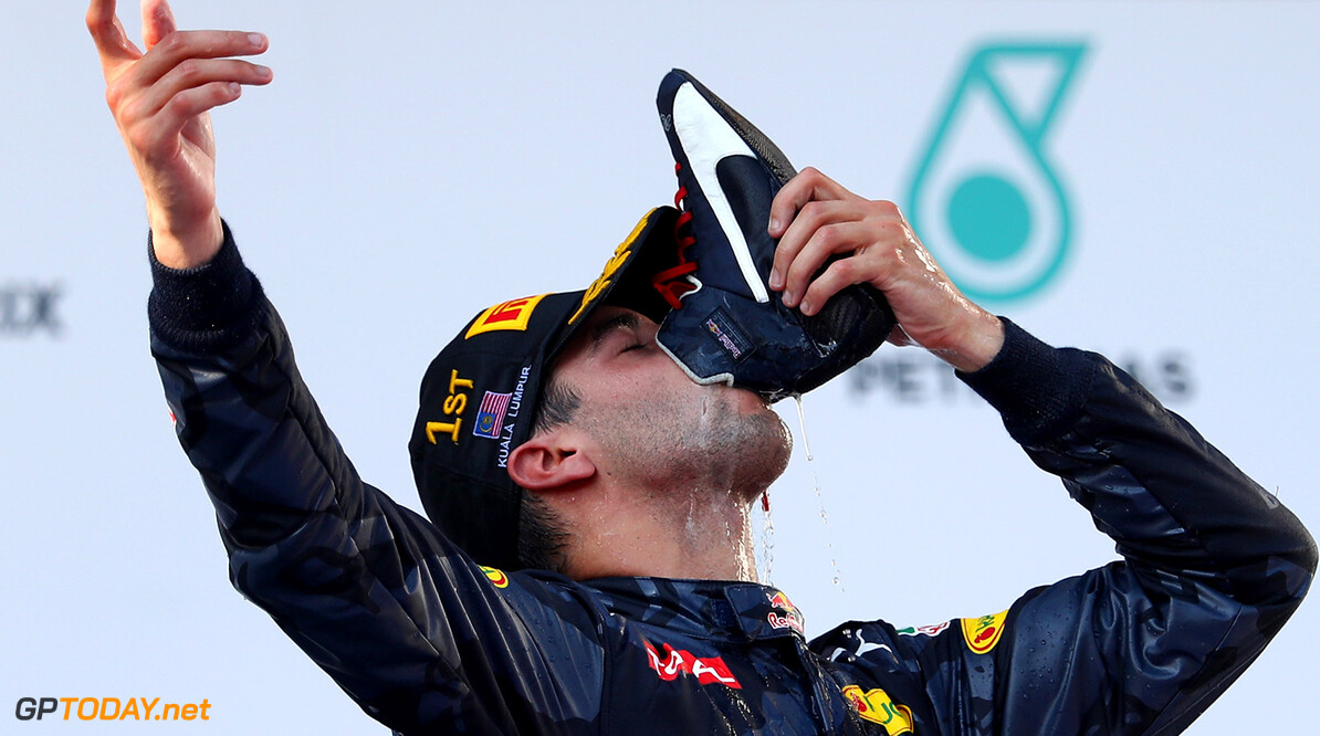 KUALA LUMPUR, MALAYSIA - OCTOBER 02:  Daniel Ricciardo of Australia and Red Bull Racing celebrates his win on the podium during the Malaysia Formula One Grand Prix at Sepang Circuit on October 2, 2016 in Kuala Lumpur, Malaysia.  (Photo by Clive Rose/Getty Images) *** BESTPIX *** // Getty Images / Red Bull Content Pool  // P-20161002-02641 // Usage for editorial use only // Please go to www.redbullcontentpool.com for further information. // 
*** BESTPIX *** F1 Grand Prix of Malaysia
Clive Rose
Kuala Lumpur
Malaysia

P-20161002-02641
