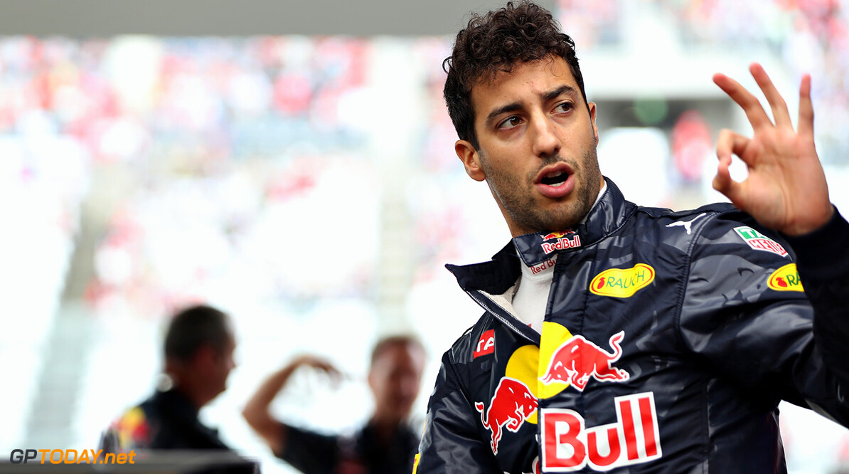 SUZUKA, JAPAN - OCTOBER 09: Daniel Ricciardo of Australia and Red Bull Racing  gets ready in the garage before the Formula One Grand Prix of Japan at Suzuka Circuit on October 9, 2016 in Suzuka.  (Photo by Mark Thompson/Getty Images) // Getty Images / Red Bull Content Pool  // P-20161009-01370 // Usage for editorial use only // Please go to www.redbullcontentpool.com for further information. // 
F1 Grand Prix of Japan
Mark Thompson
Suzuka
Japan

P-20161009-01370