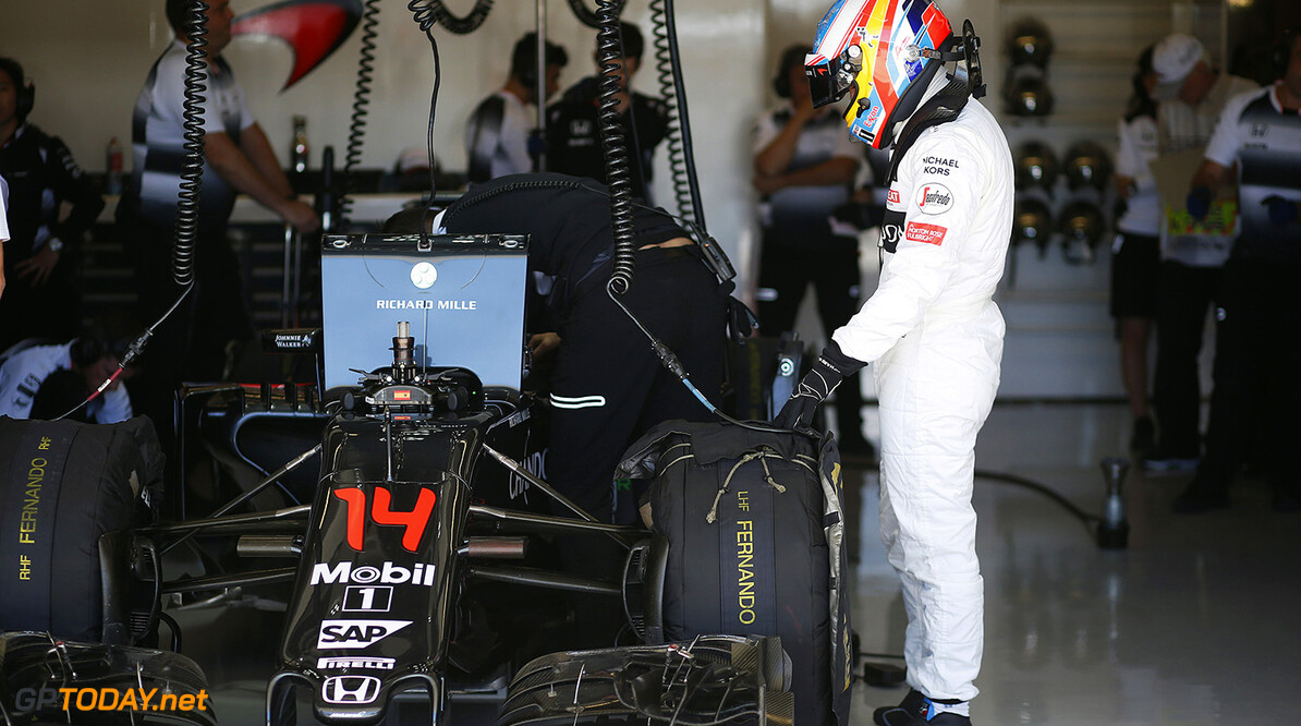Fernando Alonso in the garage.