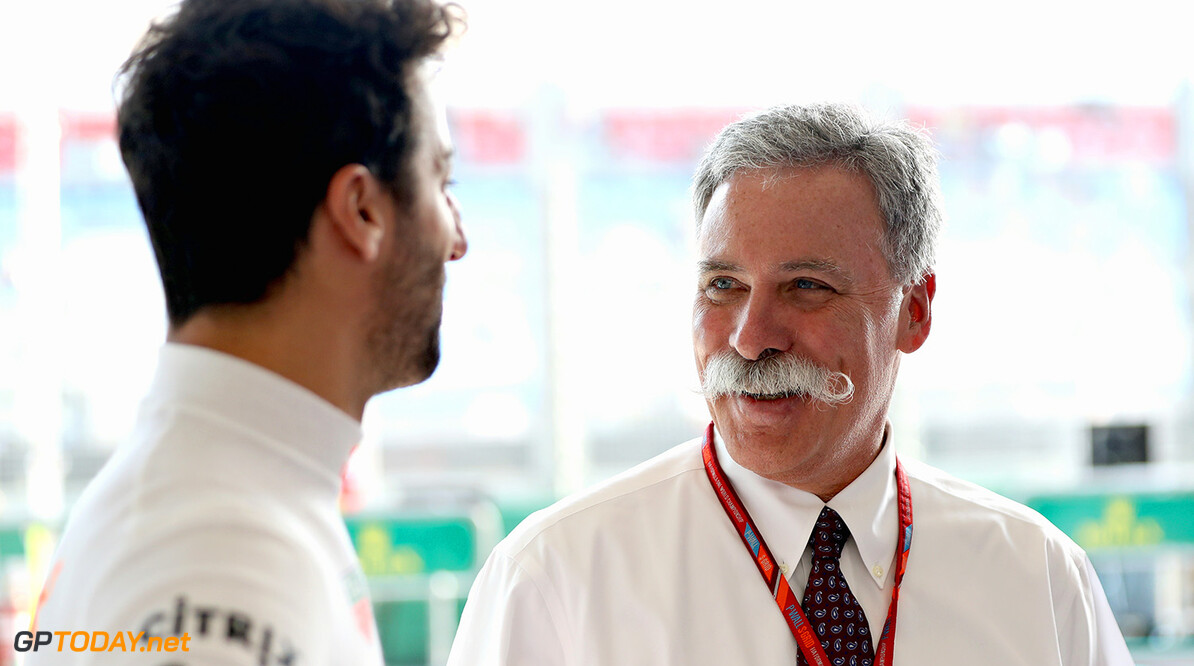 MELBOURNE, AUSTRALIA - MARCH 23:  Daniel Ricciardo of Australia and Red Bull Racing talks with Chase Carey, CEO and Executive Chairman of the Formula One Group in the Red Bull Racing garage during previews to the Australian Formula One Grand Prix at Albert Park on March 23, 2017 in Melbourne, Australia.  (Photo by Mark Thompson/Getty Images) // Getty Images / Red Bull Content Pool  // P-20170323-00448 // Usage for editorial use only // Please go to www.redbullcontentpool.com for further information. // 
Australian F1 Grand Prix - Previews
Mark Thompson
Melbourne
Australia

P-20170323-00448