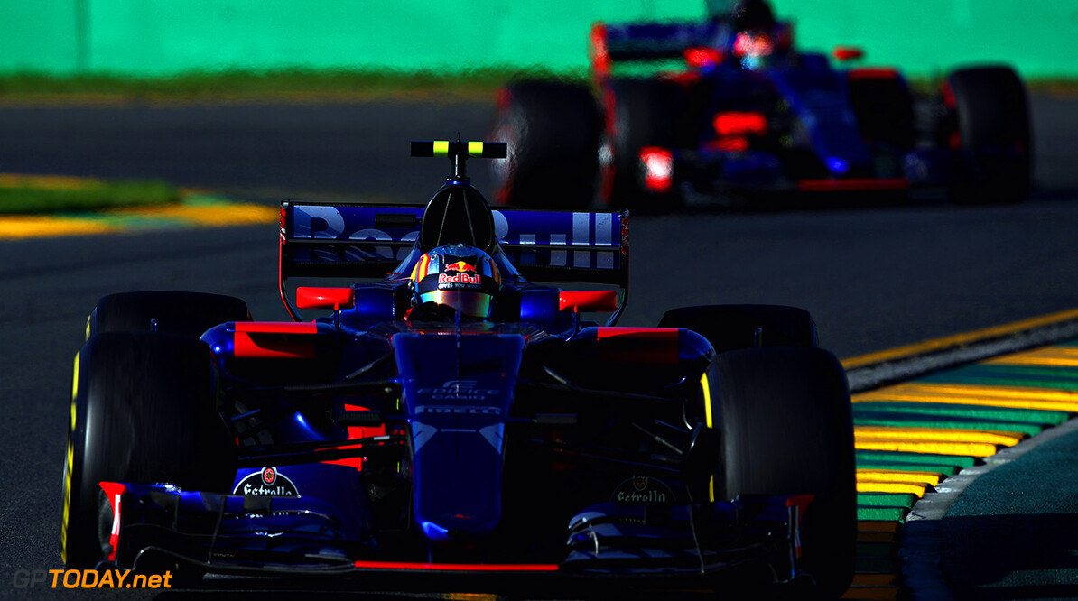 MELBOURNE, AUSTRALIA - MARCH 26: Carlos Sainz of Spain driving the (55) Scuderia Toro Rosso STR12 leads Daniil Kvyat of Russia driving the (26) Scuderia Toro Rosso STR12 on track during the Australian Formula One Grand Prix at Albert Park on March 26, 2017 in Melbourne, Australia.  (Photo by Clive Mason/Getty Images) // Getty Images / Red Bull Content Pool  // P-20170326-00607 // Usage for editorial use only // Please go to www.redbullcontentpool.com for further information. // 
Australian F1 Grand Prix
Clive Mason
Melbourne
Australia

P-20170326-00607