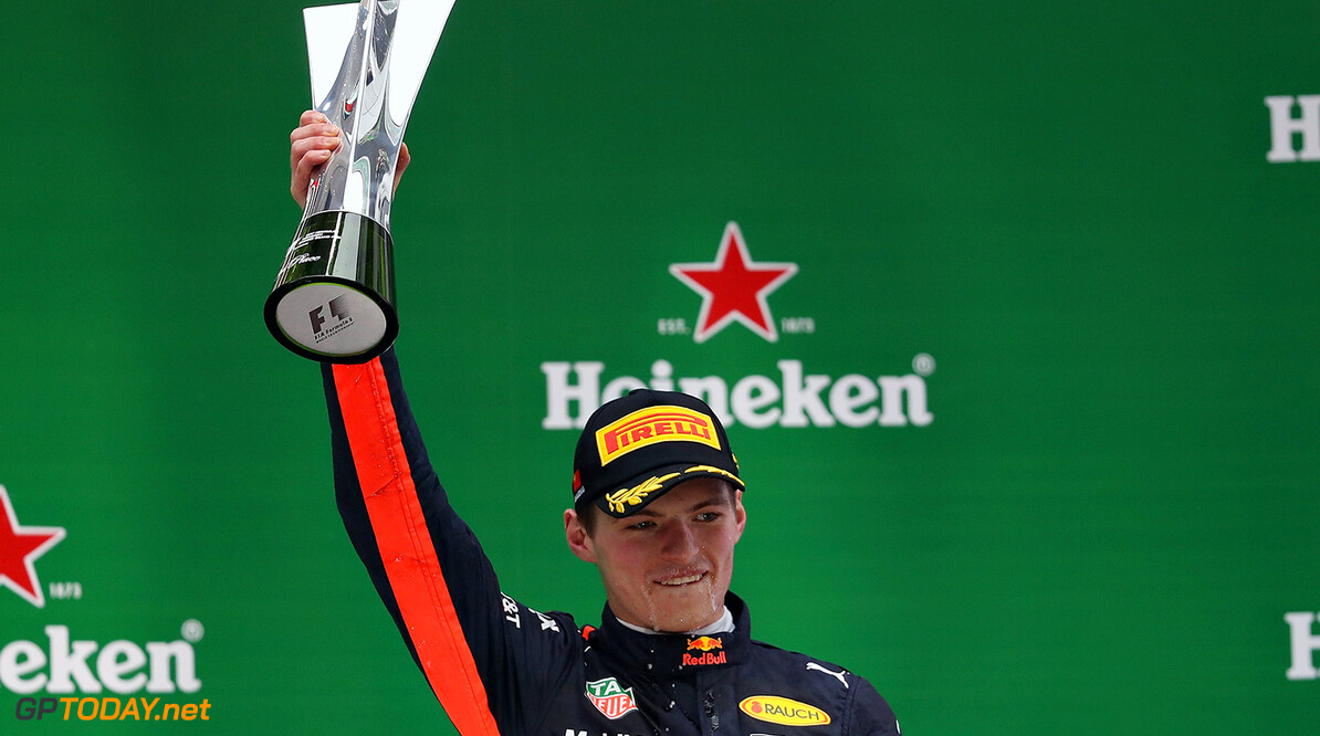 SHANGHAI, CHINA - APRIL 09: Max Verstappen of Netherlands and Red Bull Racing celebrates his third place finish on the podium  during the Formula One Grand Prix of China at Shanghai International Circuit on April 9, 2017 in Shanghai, China.  (Photo by Mark Thompson/Getty Images) // Getty Images / Red Bull Content Pool  // P-20170409-00241 // Usage for editorial use only // Please go to www.redbullcontentpool.com for further information. // 
F1 Grand Prix of China
Mark Thompson

China

P-20170409-00241