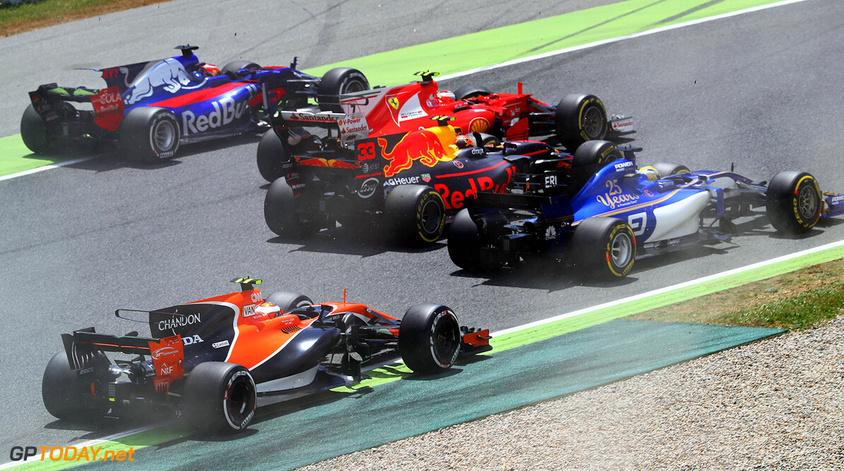 MONTMELO, SPAIN - MAY 14: Daniil Kvyat of Russia driving the (26) Scuderia Toro Rosso STR12, Kimi Raikkonen of Finland driving the (7) Scuderia Ferrari SF70H, Max Verstappen of the Netherlands driving the (33) Red Bull Racing Red Bull-TAG Heuer RB13 TAG Heuer, Marcus Ericsson of Sweden driving the (9) Sauber F1 Team Sauber C36 Ferrari and Stoffel Vandoorne of Belgium driving the (2) McLaren Honda Formula 1 Team McLaren MCL32  during the Spanish Formula One Grand Prix at Circuit de Catalunya on May 14, 2017 in Montmelo, Spain.  (Photo by Mark Thompson/Getty Images) // Getty Images / Red Bull Content Pool  // P-20170514-01243 // Usage for editorial use only // Please go to www.redbullcontentpool.com for further information. // 
Spanish F1 Grand Prix
Mark Thompson

Spain

P-20170514-01243