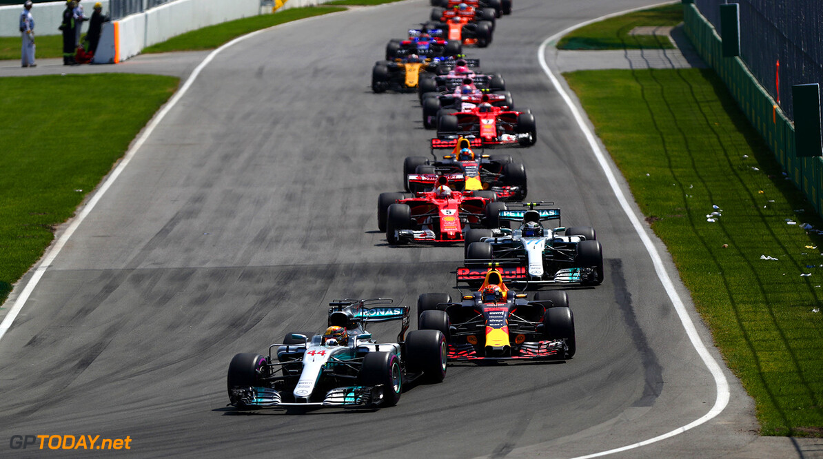 MONTREAL, QC - JUNE 11:  Lewis Hamilton of Great Britain driving the (44) Mercedes AMG Petronas F1 Team Mercedes F1 WO8 leads Max Verstappen of Netherlands and Red Bull Racing and the rest of the field before the restart during the Canadian Formula One Grand Prix at Circuit Gilles Villeneuve on June 11, 2017 in Montreal, Canada.  (Photo by Dan Istitene/Getty Images) // Getty Images / Red Bull Content Pool  // P-20170612-00220 // Usage for editorial use only // Please go to www.redbullcontentpool.com for further information. // 
Canadian F1 Grand Prix
Dan Istitene

Canada

P-20170612-00220