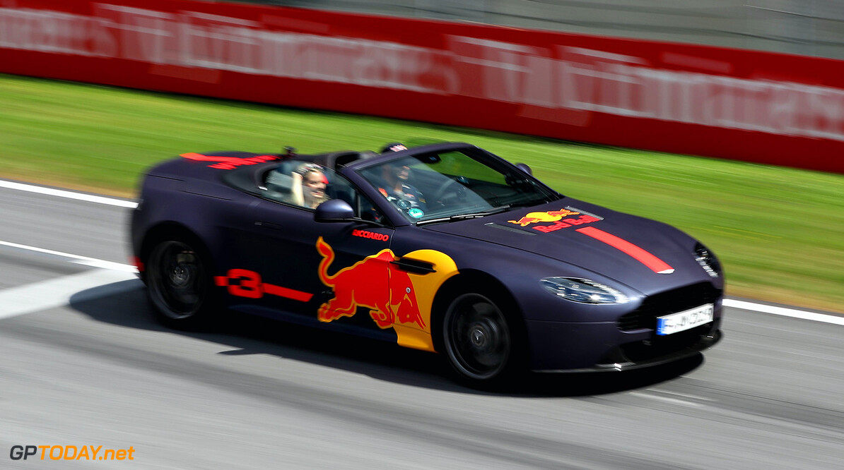 SPIELBERG, AUSTRIA - JULY 06:  Daniel Ricciardo of Australia and Red Bull Racing drives guests round the circuit in an Aston Martin during previews ahead of the Formula One Grand Prix of Austria at Red Bull Ring on July 6, 2017 in Spielberg, Austria.  (Photo by Mark Thompson/Getty Images) // Getty Images / Red Bull Content Pool  // P-20170706-02315 // Usage for editorial use only // Please go to www.redbullcontentpool.com for further information. // 
F1 Grand Prix of Austria - Previews
Mark Thompson
Red Bull Ring
Austria

P-20170706-02315