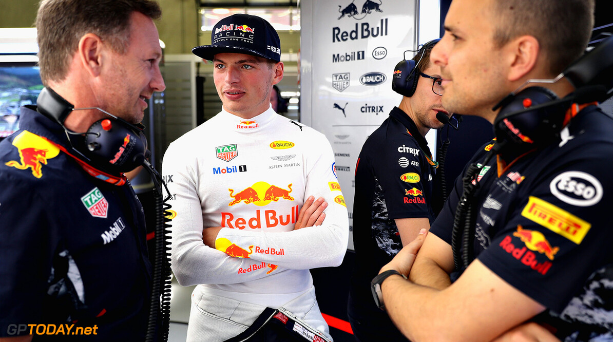 SPIELBERG, AUSTRIA - JULY 07: Max Verstappen of Netherlands and Red Bull Racing talks with race engineer Gianpiero Lambiase and Red Bull Racing Team Principal Christian Horner in the garage during practice for the Formula One Grand Prix of Austria at Red Bull Ring on July 7, 2017 in Spielberg, Austria.  (Photo by Mark Thompson/Getty Images) // Getty Images / Red Bull Content Pool  // P-20170707-01919 // Usage for editorial use only // Please go to www.redbullcontentpool.com for further information. // 
F1 Grand Prix of Austria - Practice
Mark Thompson
Red Bull Ring
Austria

P-20170707-01919