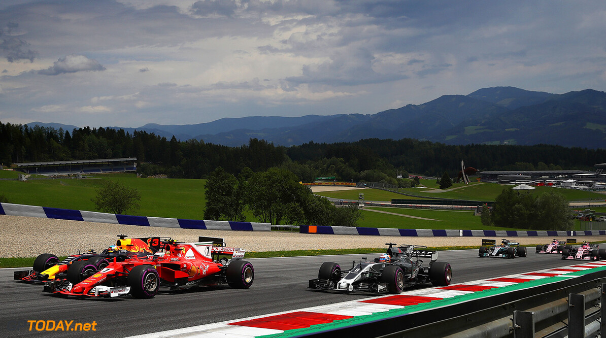 SPIELBERG, AUSTRIA - JULY 09: Daniel Ricciardo of Australia driving the (3) Red Bull Racing Red Bull-TAG Heuer RB13 TAG Heuer, Kimi Raikkonen of Finland driving the (7) Scuderia Ferrari SF70H and Romain Grosjean of France driving the (8) Haas F1 Team Haas-Ferrari VF-17 Ferrari battle for position at the start  during the Formula One Grand Prix of Austria at Red Bull Ring on July 9, 2017 in Spielberg, Austria.  (Photo by Clive Mason/Getty Images) // Getty Images / Red Bull Content Pool  // P-20170709-04016 // Usage for editorial use only // Please go to www.redbullcontentpool.com for further information. // 
F1 Grand Prix of Austria
Clive Mason
Red Bull Ring
Austria

P-20170709-04016