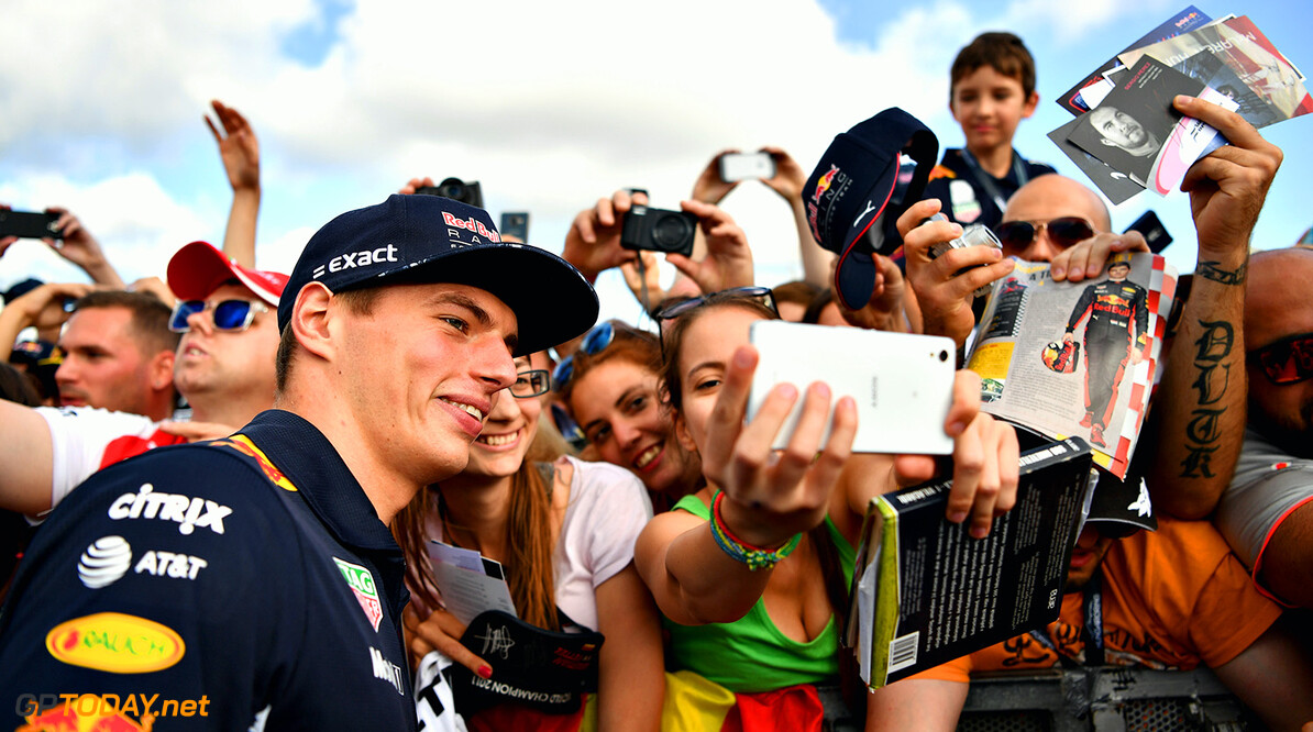 BUDAPEST, HUNGARY - JULY 27:  Max Verstappen of Netherlands and Red Bull Racing poses for a photo with fans at the drivers autograph signing session during previews ahead of the Formula One Grand Prix of Hungary at Hungaroring on July 27, 2017 in Budapest, Hungary.  (Photo by Dan Mullan/Getty Images) // Getty Images / Red Bull Content Pool  // P-20170727-01095 // Usage for editorial use only // Please go to www.redbullcontentpool.com for further information. // 
F1 Grand Prix of Hungary - Previews
Dan Mullan
Budapest
Hungary

P-20170727-01095