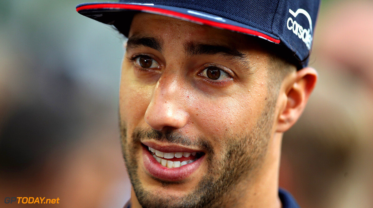 SINGAPORE - SEPTEMBER 14:  Daniel Ricciardo of Australia and Red Bull Racing talks to the media in the Paddock during previews ahead of the Formula One Grand Prix of Singapore at Marina Bay Street Circuit on September 14, 2017 in Singapore.  (Photo by Clive Mason/Getty Images) // Getty Images / Red Bull Content Pool  // P-20170914-00549 // Usage for editorial use only // Please go to www.redbullcontentpool.com for further information. // 
F1 Grand Prix of Singapore - Previews
Clive Mason
Singapore
Singapore

P-20170914-00549