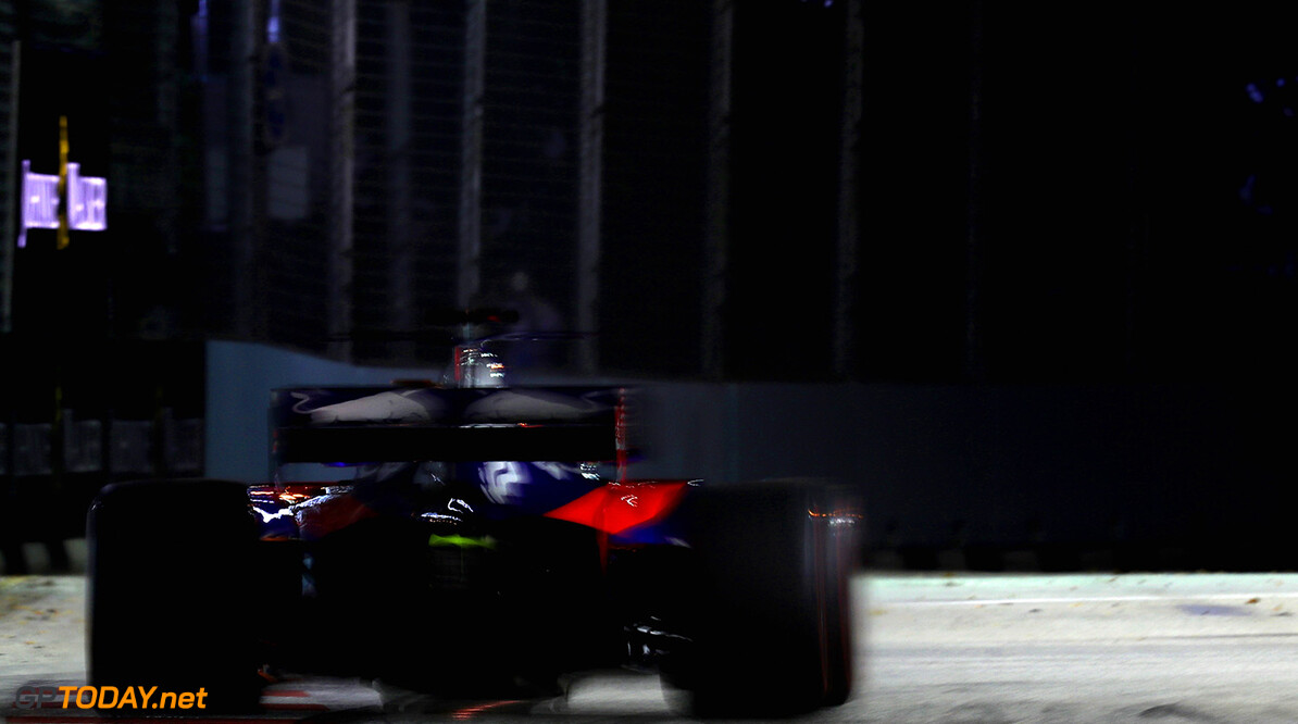 SINGAPORE - SEPTEMBER 15: Daniil Kvyat of Russia driving the (26) Scuderia Toro Rosso STR12 on track during practice for the Formula One Grand Prix of Singapore at Marina Bay Street Circuit on September 15, 2017 in Singapore.  (Photo by Mark Thompson/Getty Images) // Getty Images / Red Bull Content Pool  // P-20170915-01453 // Usage for editorial use only // Please go to www.redbullcontentpool.com for further information. // 
F1 Grand Prix of Singapore - Practice
Mark Thompson
Singapore
Singapore

P-20170915-01453