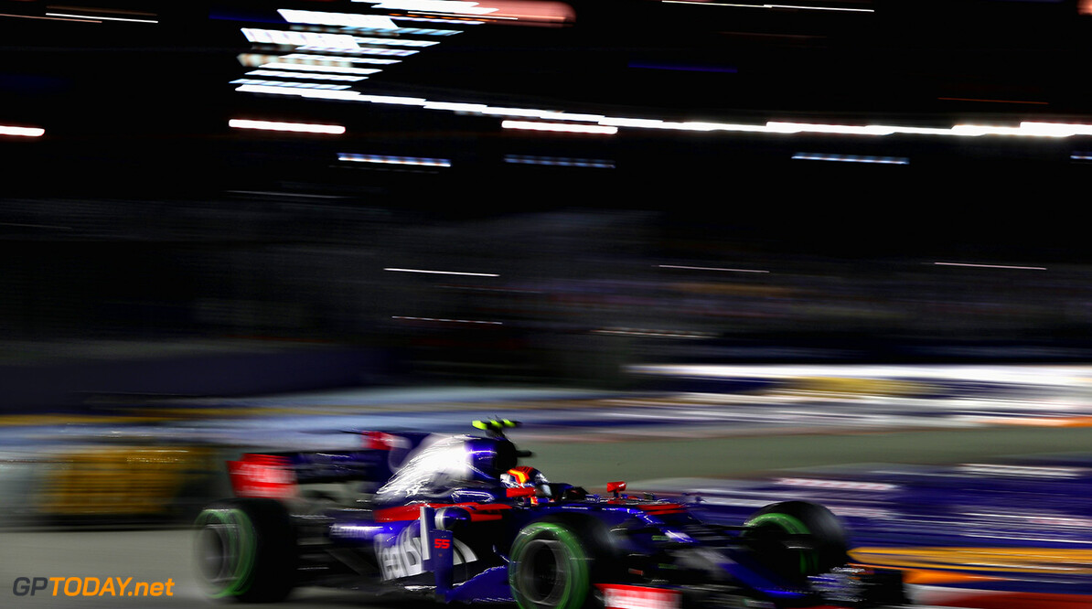 SINGAPORE - SEPTEMBER 17: Carlos Sainz of Spain driving the (55) Scuderia Toro Rosso STR12 on track during the Formula One Grand Prix of Singapore at Marina Bay Street Circuit on September 17, 2017 in Singapore.  (Photo by Mark Thompson/Getty Images) // Getty Images / Red Bull Content Pool  // P-20170917-01584 // Usage for editorial use only // Please go to www.redbullcontentpool.com for further information. // 
F1 Grand Prix of Singapore
Mark Thompson
Singapore
Singapore

P-20170917-01584