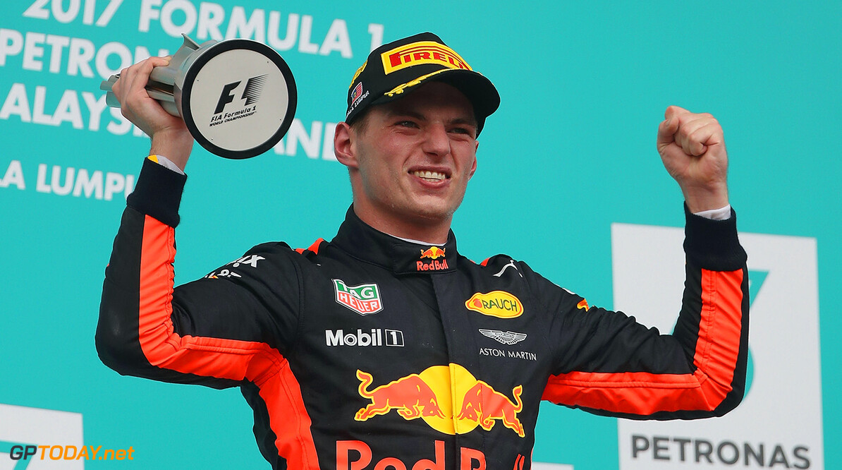 KUALA LUMPUR, MALAYSIA - OCTOBER 01:  Race winner Max Verstappen of Netherlands and Red Bull Racing celebrates on the podium during the Malaysia Formula One Grand Prix at Sepang Circuit on October 1, 2017 in Kuala Lumpur, Malaysia.  (Photo by Clive Mason/Getty Images) // Getty Images / Red Bull Content Pool  // P-20171001-00560 // Usage for editorial use only // Please go to www.redbullcontentpool.com for further information. // 
F1 Grand Prix of Malaysia
Clive Mason
Sepang
Malaysia

P-20171001-00560