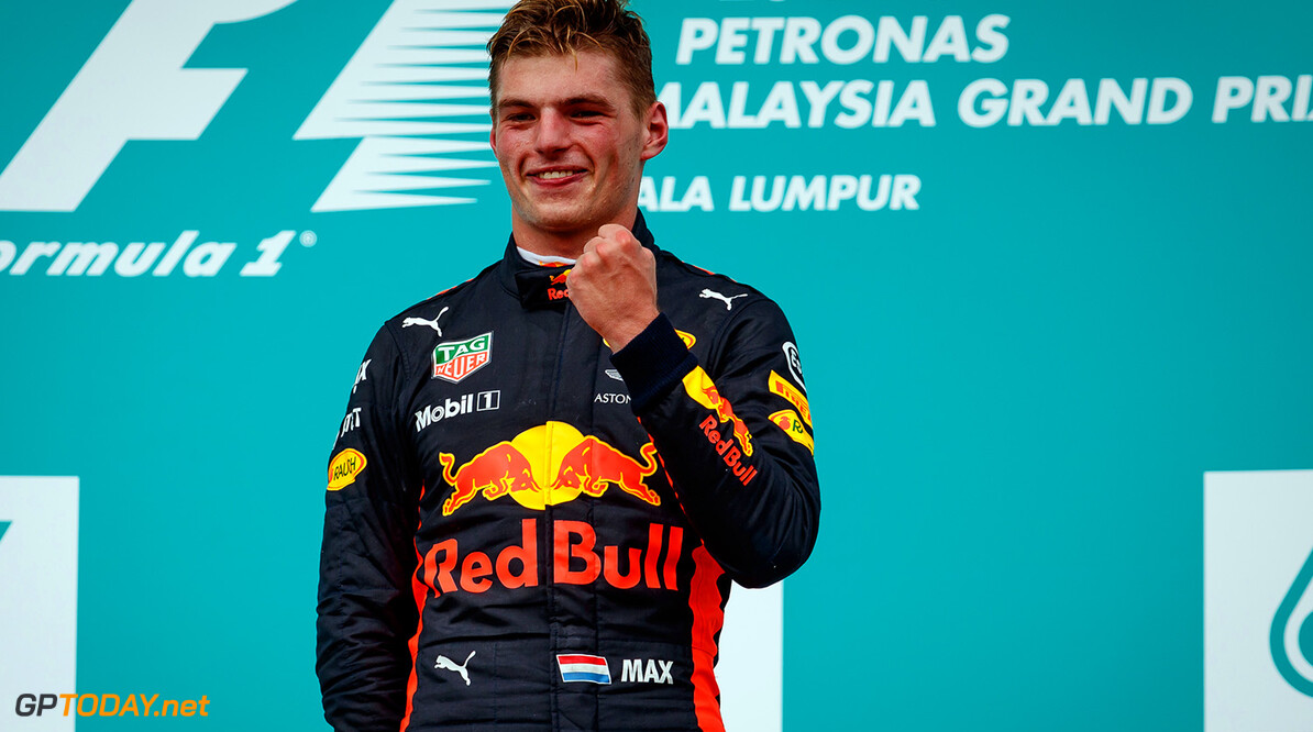KUALA LUMPUR, MALAYSIA - OCTOBER 01:  Race winner Max Verstappen of Netherlands and Red Bull Racing celebrates on the podium during the Malaysia Formula One Grand Prix at Sepang Circuit on October 1, 2017 in Kuala Lumpur, Malaysia.  (Photo by Lars Baron/Getty Images) // Getty Images / Red Bull Content Pool  // P-20171001-00557 // Usage for editorial use only // Please go to www.redbullcontentpool.com for further information. // 
F1 Grand Prix of Malaysia

Sepang
Malaysia

P-20171001-00557