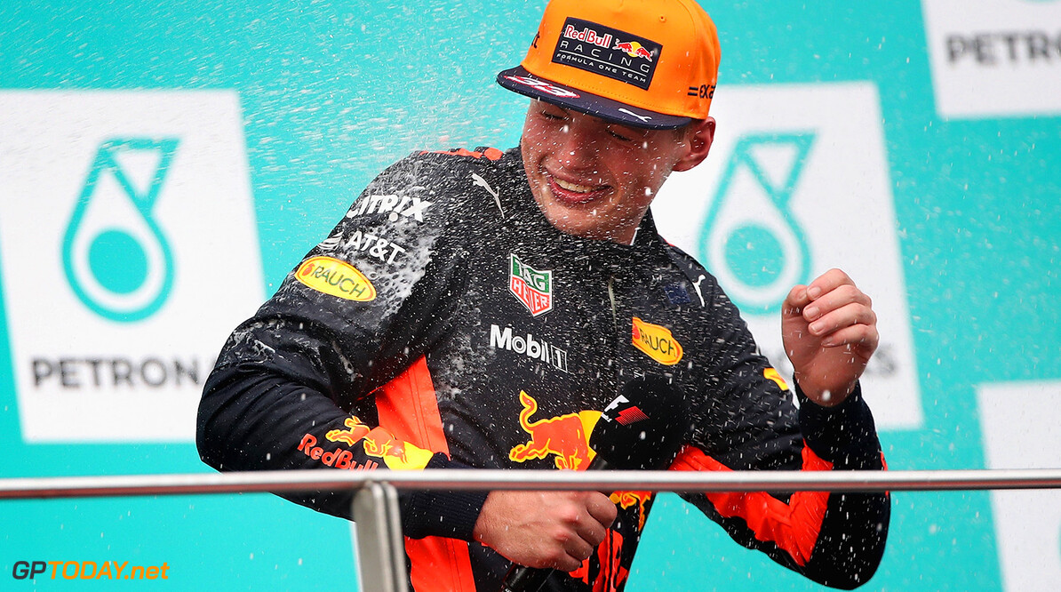 KUALA LUMPUR, MALAYSIA - OCTOBER 01:  Race winner Max Verstappen of Netherlands and Red Bull Racing celebrates on the podium during the Malaysia Formula One Grand Prix at Sepang Circuit on October 1, 2017 in Kuala Lumpur, Malaysia.  (Photo by Clive Mason/Getty Images) // Getty Images / Red Bull Content Pool  // P-20171001-01342 // Usage for editorial use only // Please go to www.redbullcontentpool.com for further information. // 
F1 Grand Prix of Malaysia
Clive Mason
Sepang
Malaysia

P-20171001-01342