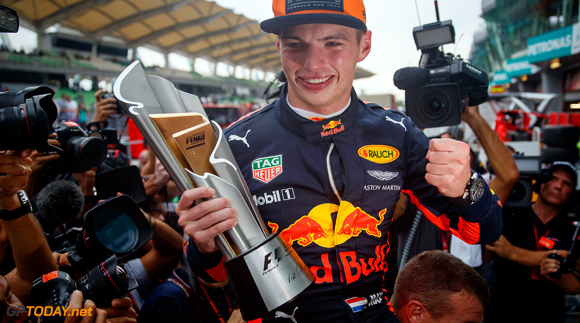 KUALA LUMPUR, MALAYSIA - OCTOBER 01:  Race winner Max Verstappen of Netherlands and Red Bull Racing celebrates with his team during the Malaysia Formula One Grand Prix at Sepang Circuit on October 1, 2017 in Kuala Lumpur, Malaysia.  (Photo by Lars Baron/Getty Images) // Getty Images / Red Bull Content Pool  // P-20171001-00788 // Usage for editorial use only // Please go to www.redbullcontentpool.com for further information. // 
F1 Grand Prix of Malaysia

Sepang
Malaysia

P-20171001-00788