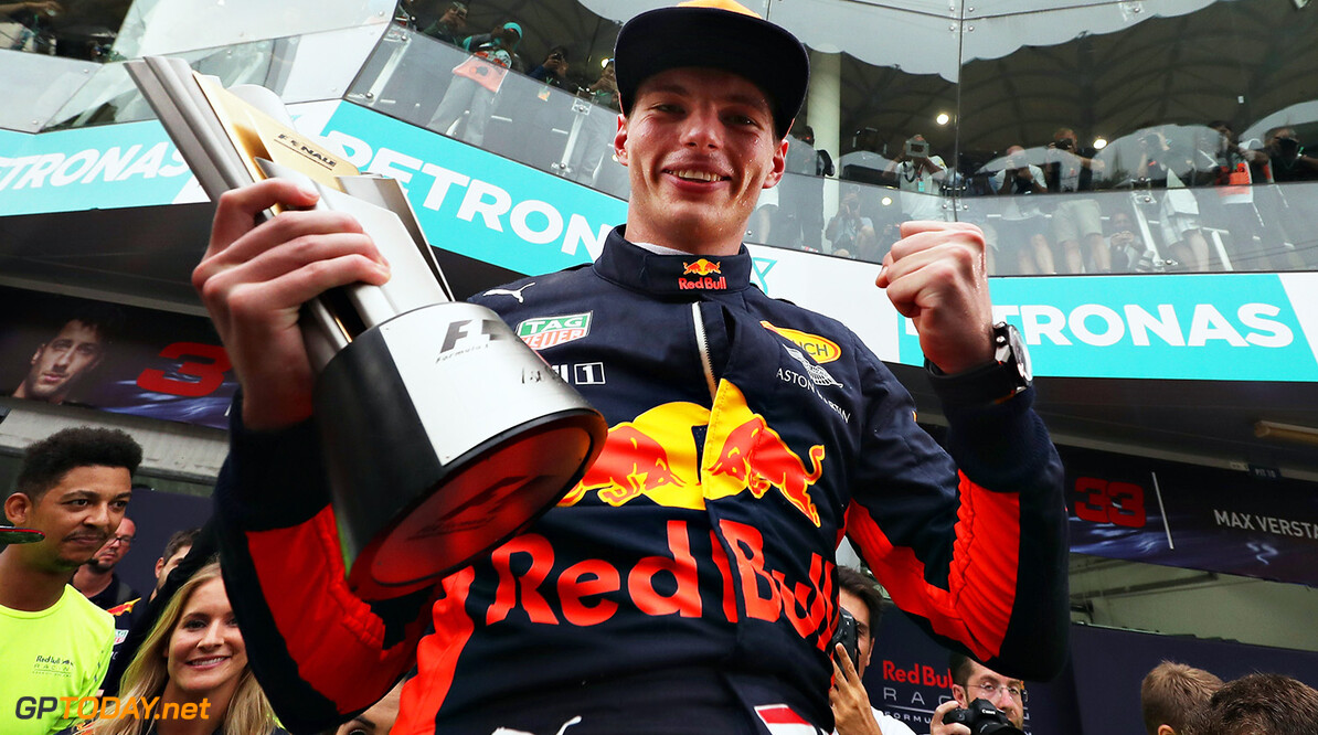 KUALA LUMPUR, MALAYSIA - OCTOBER 01:  Race winner Max Verstappen of Netherlands and Red Bull Racing celebrates with his team during the Malaysia Formula One Grand Prix at Sepang Circuit on October 1, 2017 in Kuala Lumpur, Malaysia.  (Photo by Mark Thompson/Getty Images) // Getty Images / Red Bull Content Pool  // P-20171001-00914 // Usage for editorial use only // Please go to www.redbullcontentpool.com for further information. // 
F1 Grand Prix of Malaysia
Mark Thompson
Sepang
Malaysia

P-20171001-00914
